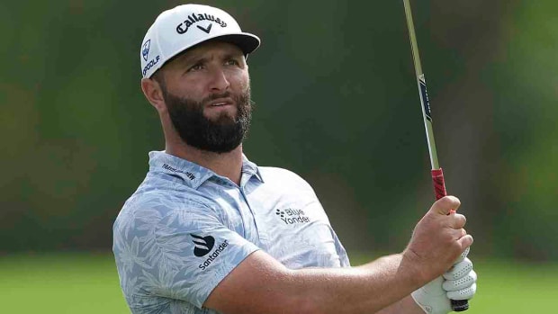 Jon Rahm plays during the 2023 DP World Tour Championship golf tournament, in Dubai, United Arab Emirates.